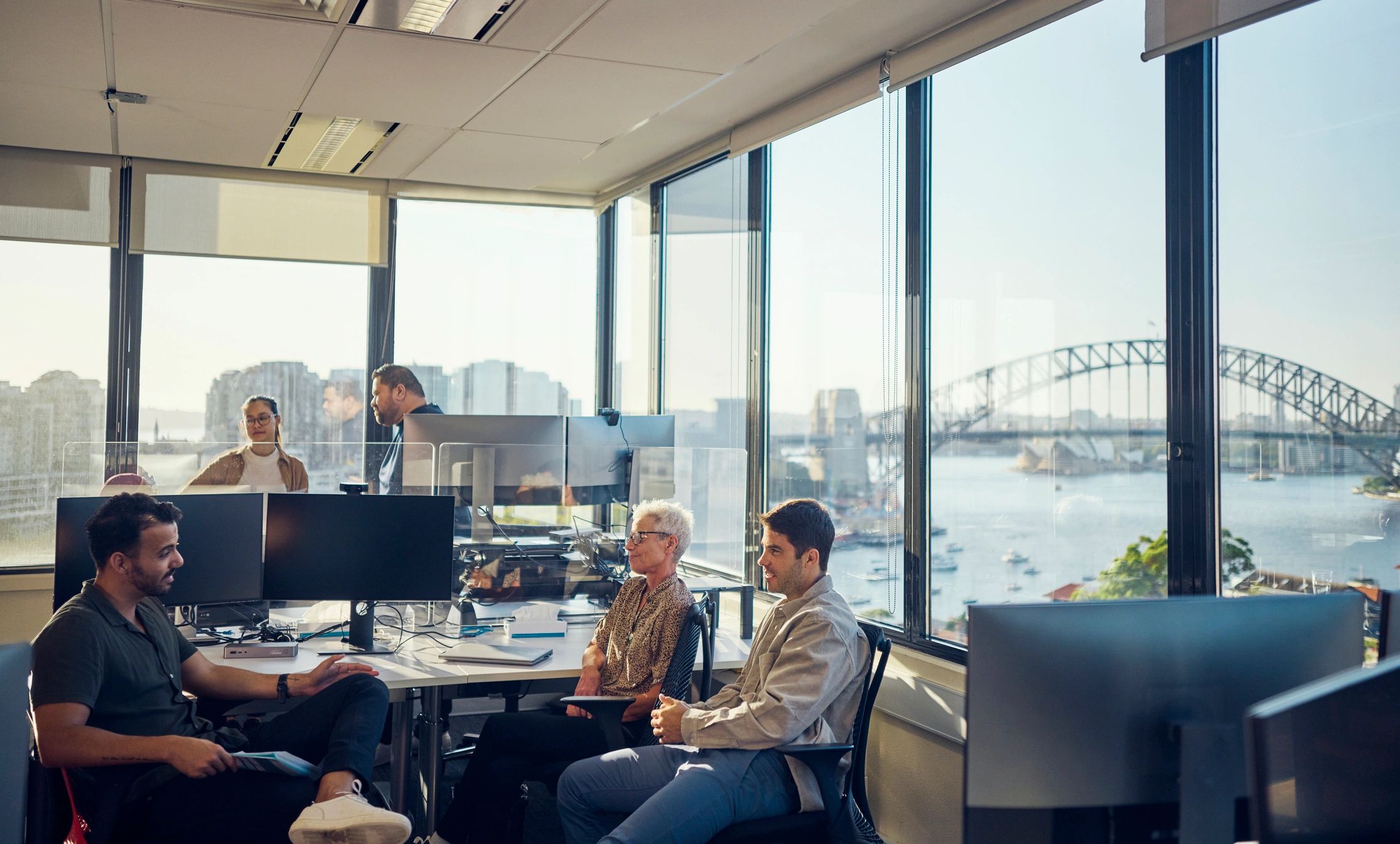 IT professionals collaborating in an office environment